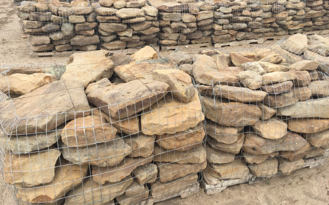 The larger stones are separated and palletized as Homestead Oversize Wall Stone.